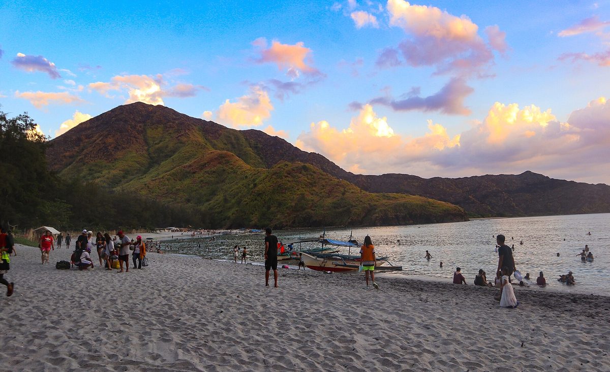 Anawangin Cove in Zambales, one of the best beaches near Manila, with ash-grey sand and agoho pines