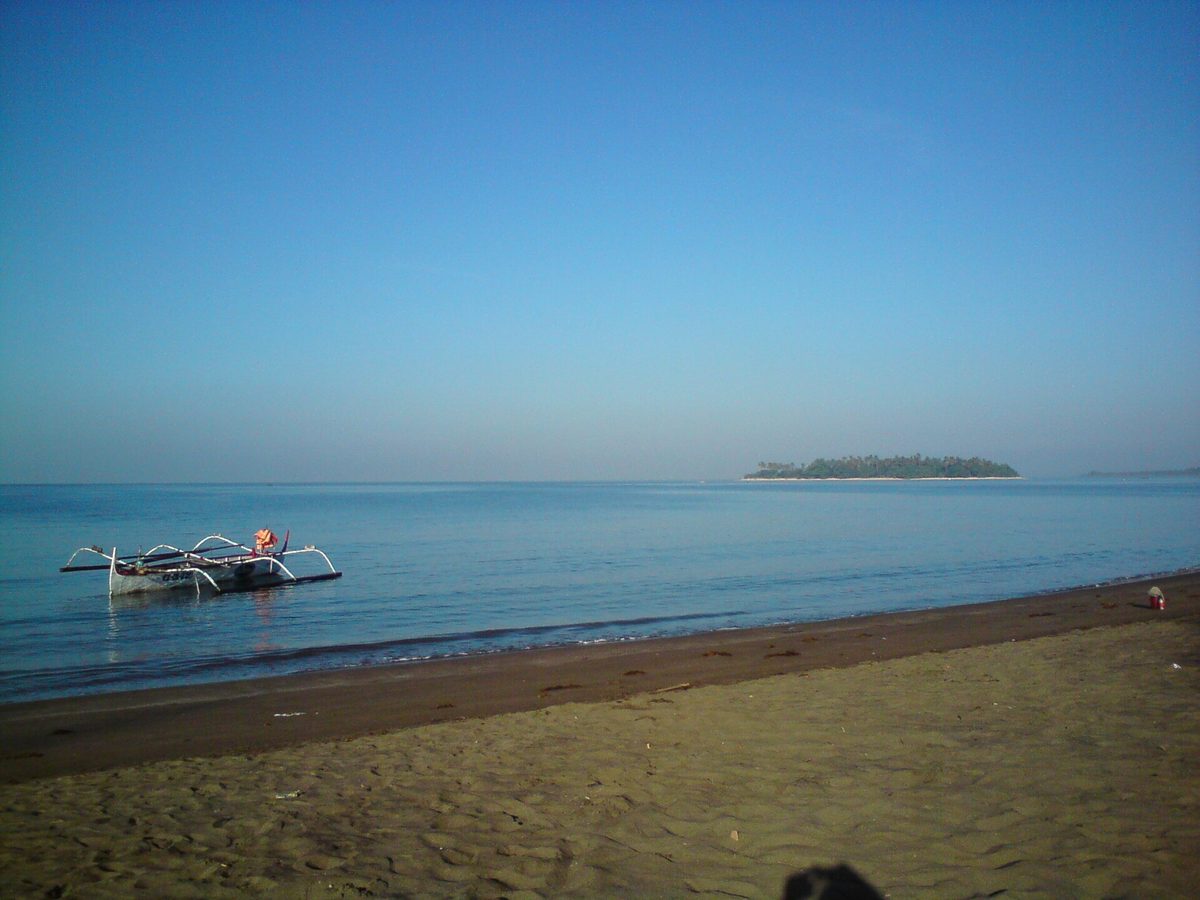 Potipot Island near Candelaria, Zambales, ringed by pale sand and shallow water