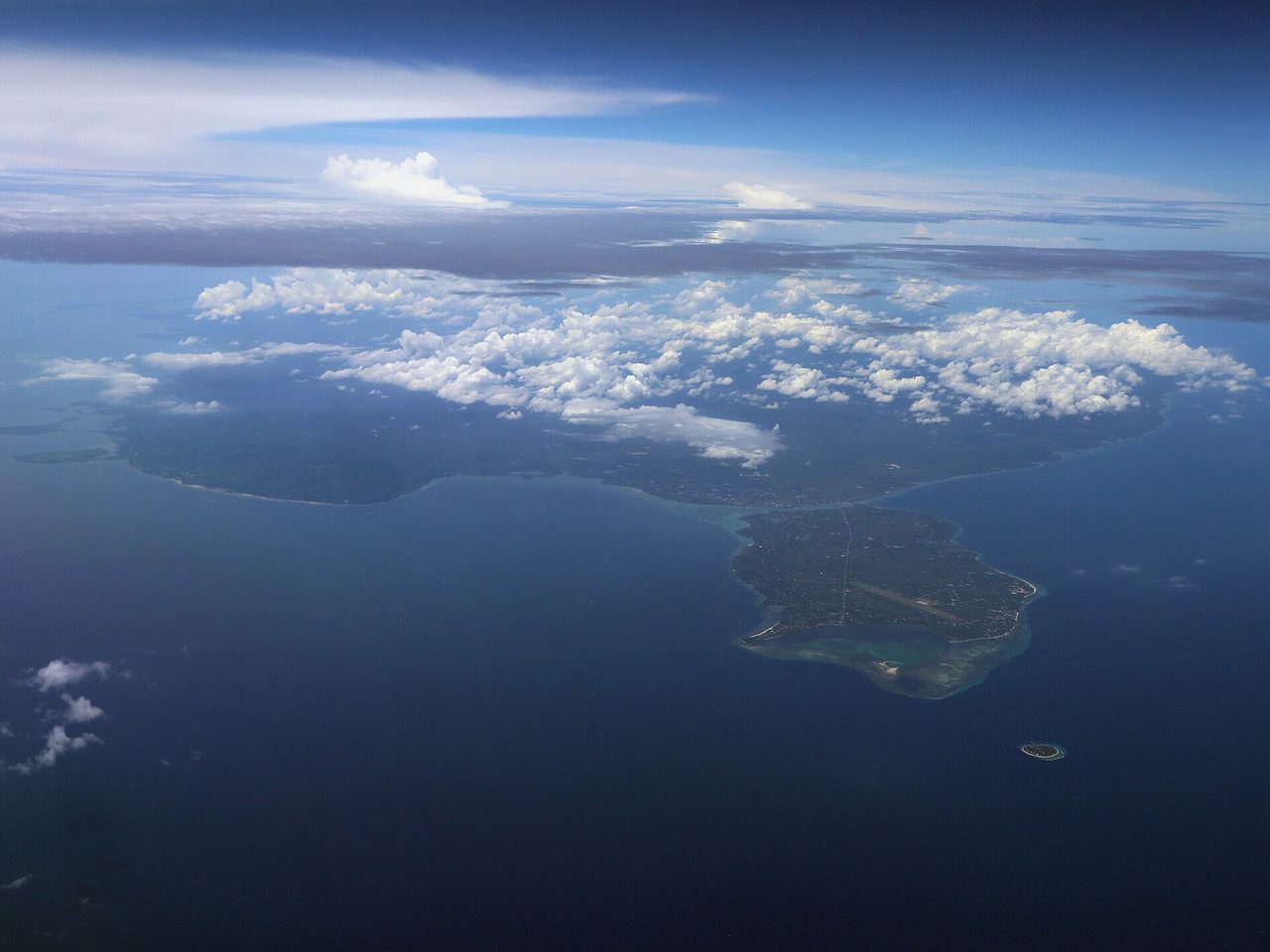 Aerial view of Panglao Island, Bohol, with Balicasag Island visible offshore