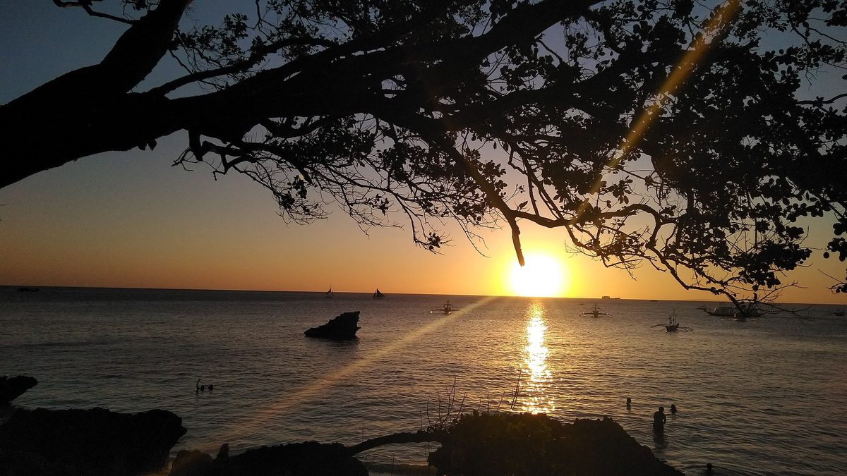 Sunset over Diniwid Beach, a quieter cove just north of White Beach on Boracay
