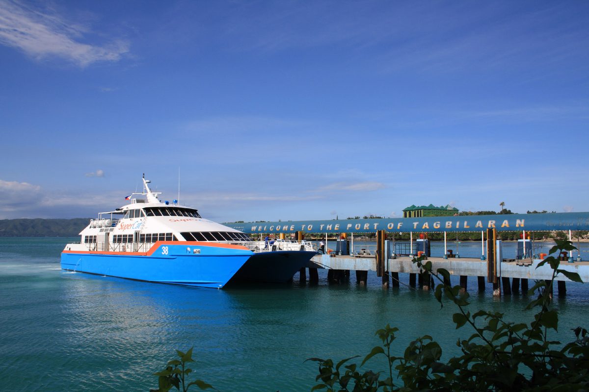 A SuperCat fast ferry at port, the kind that crosses between Cebu and Bohol
