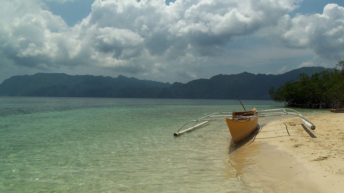 CYC Beach near Coron town, a small white-sand lunch stop on Coron boat tours in Palawan, Philippines
