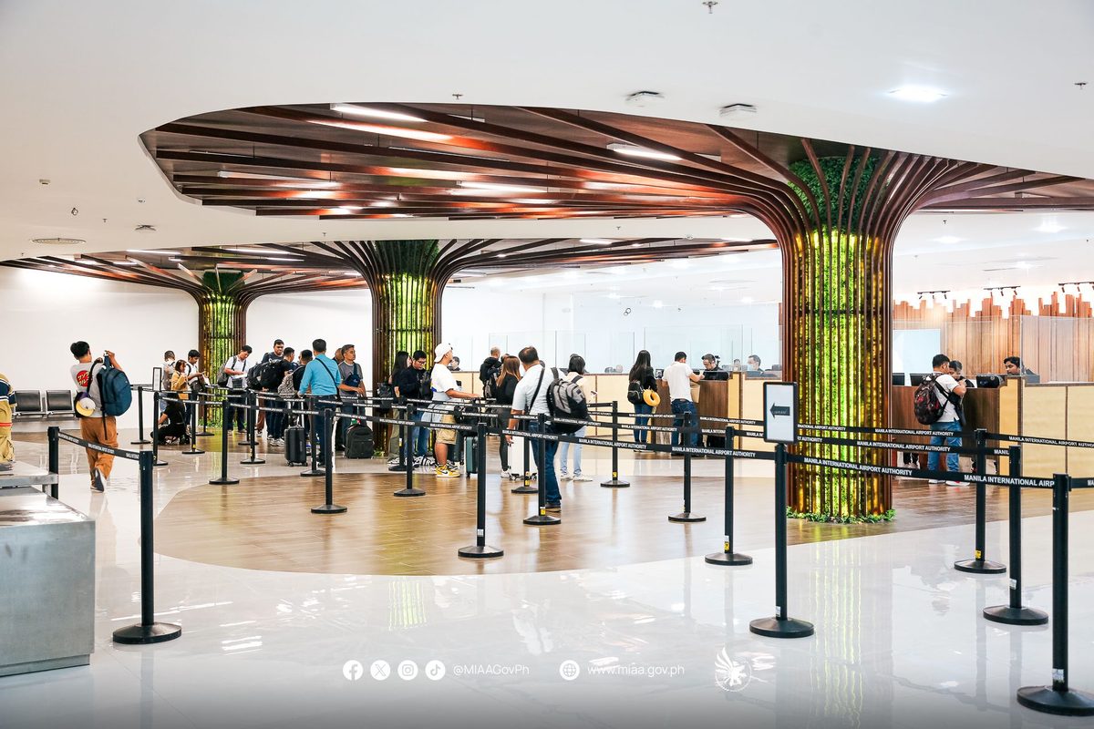 Ninoy Aquino International Airport terminal in Manila, the main gateway where eTravel Philippines QR codes are scanned