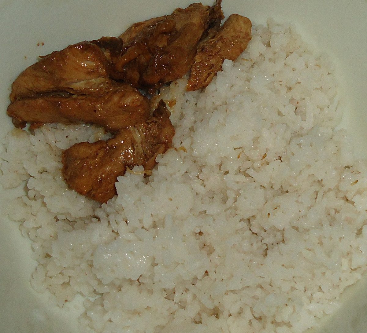 Chicken adobo, the unofficial national dish of the Philippines, braised in soy sauce, vinegar and garlic