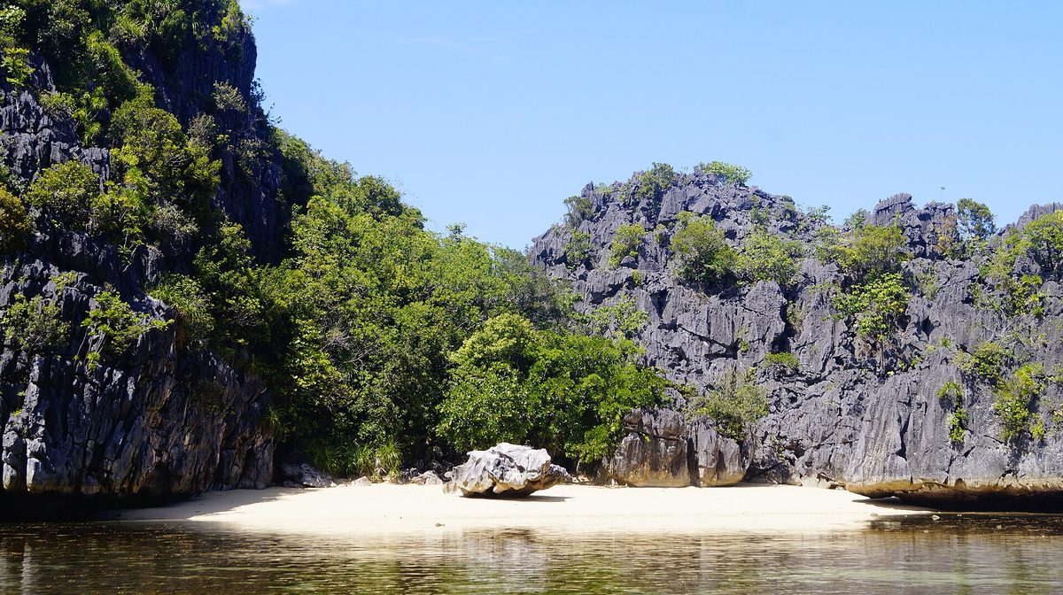 Limestone islands and white sand beach in Caramoan, Camarines Sur