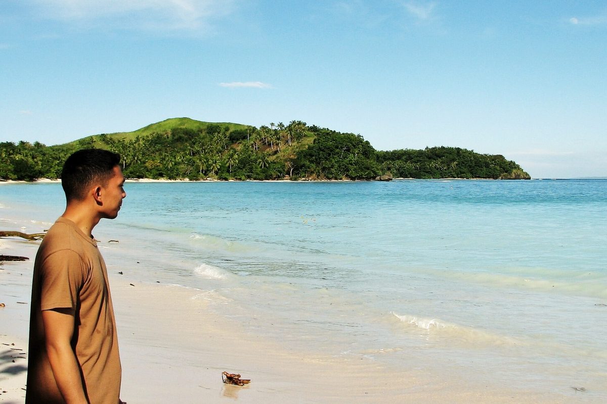 Pinkish-white sand at Subic Beach in Matnog, Sorsogon