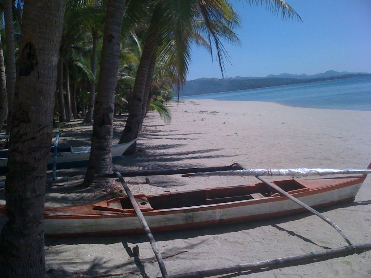 Quiet pale-sand beach and clear shallows in Romblon province, an underrated corner of the Philippines