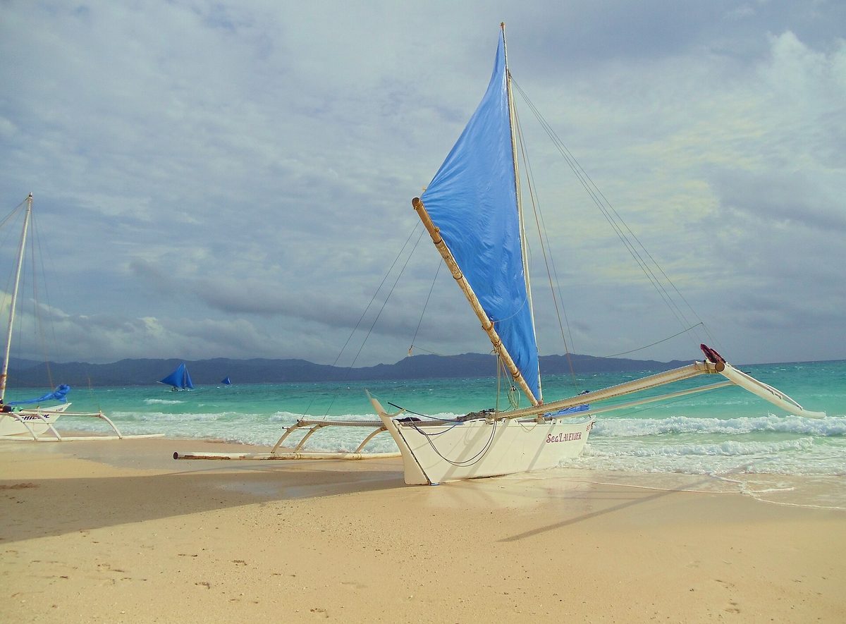Outrigger boats on the water near Boracay, the standard ferry for crossing from Caticlan