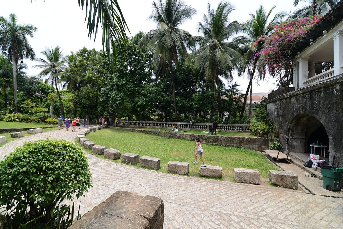 Old Spanish stone defensive walls surrounding Intramuros in Manila