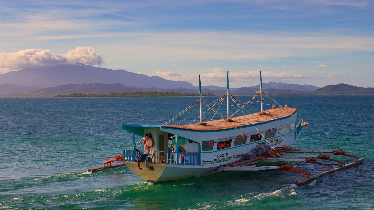 Outrigger banca boat used to reach dive sites at a Philippine dive resort
