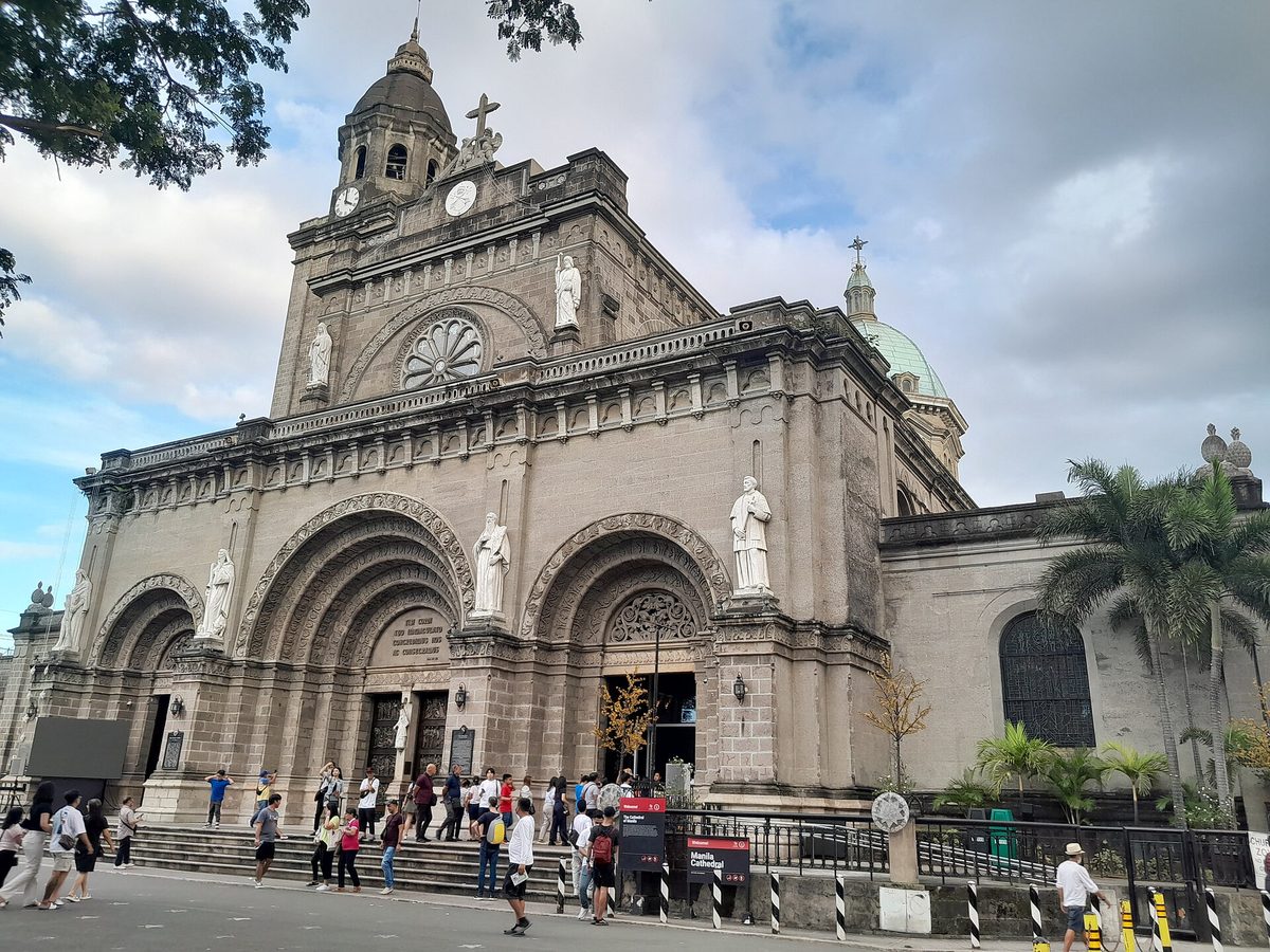 Manila Cathedral in Intramuros under a blue sky