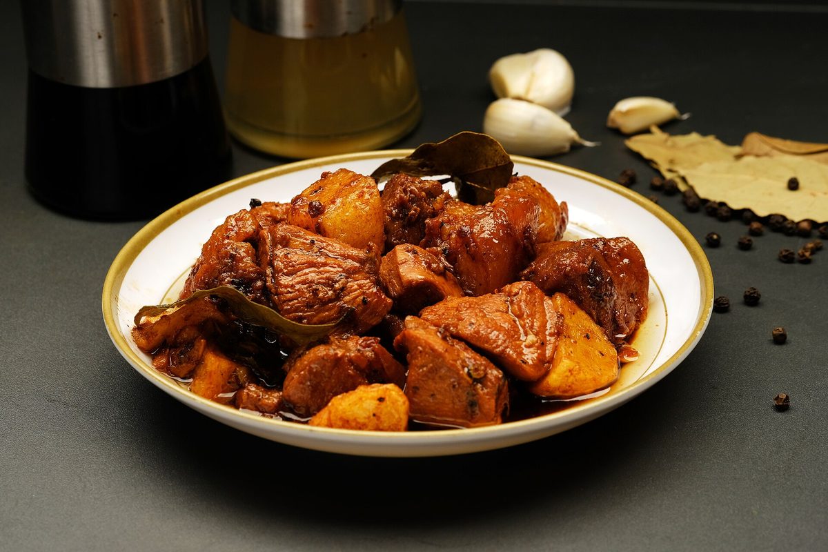Filipino chicken adobo, a dish featured in this Manila food guide