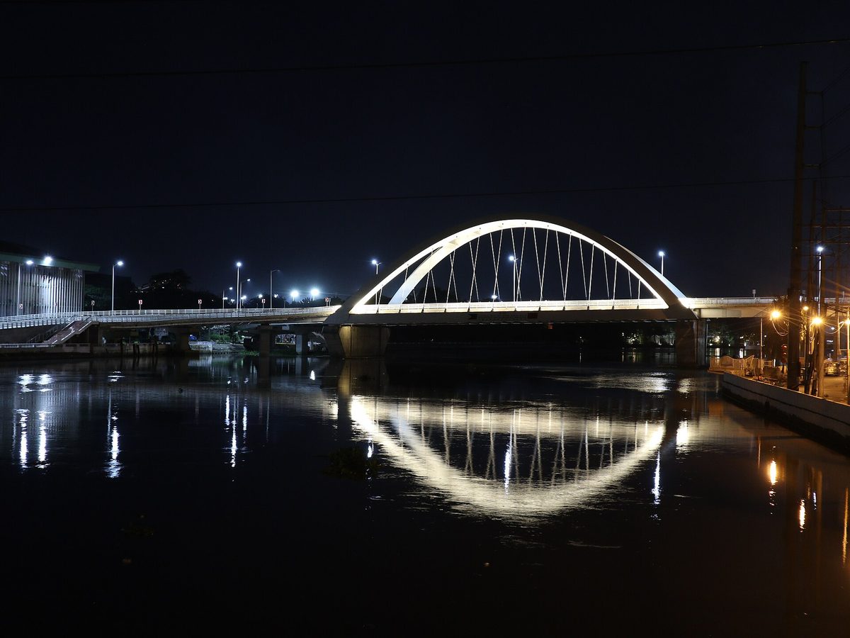 The Binondo-Intramuros bridge and old Manila skyline lit up at night