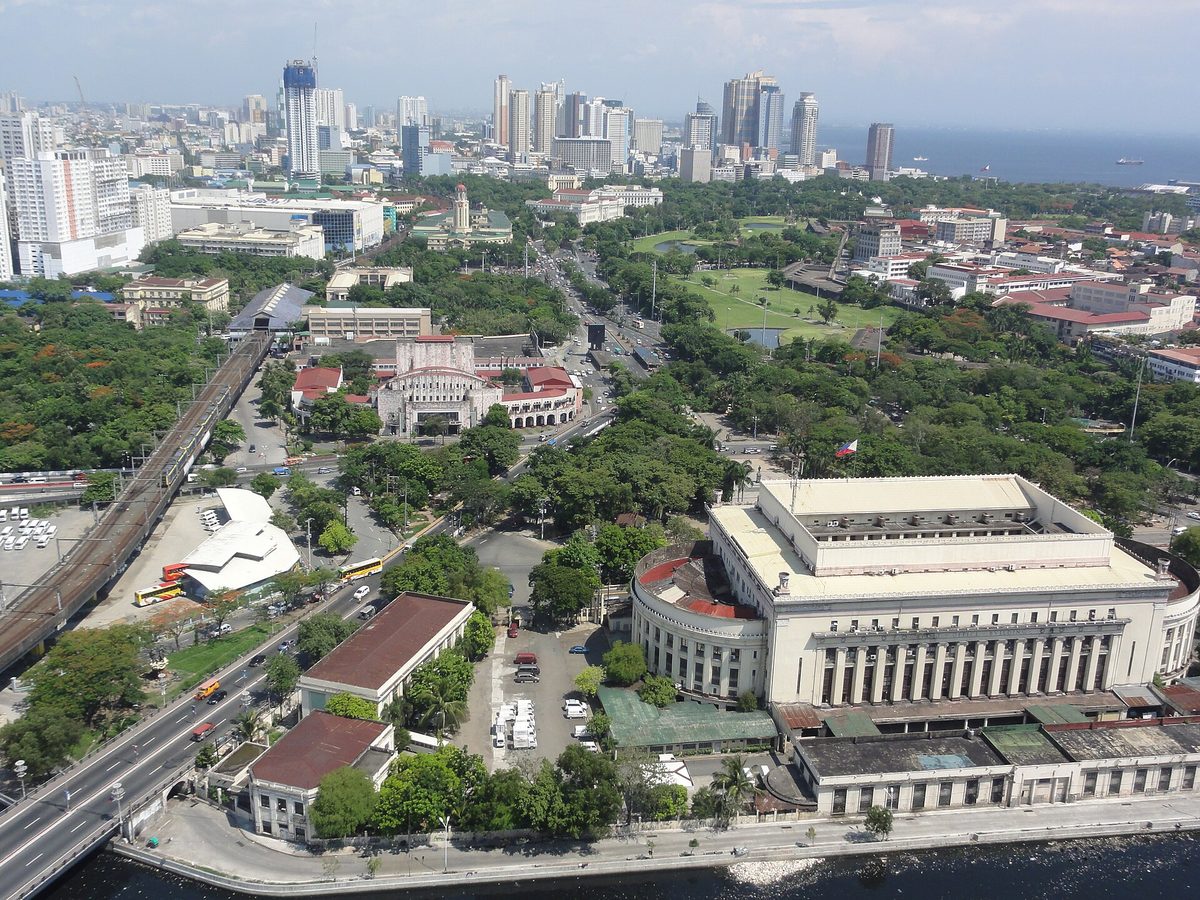 Sprawling Metro Manila cityscape stretching to the horizon