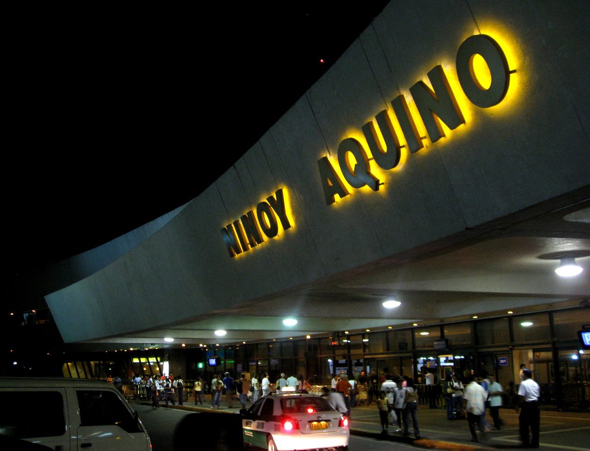 Signage at Ninoy Aquino International Airport pointing to NAIA terminals