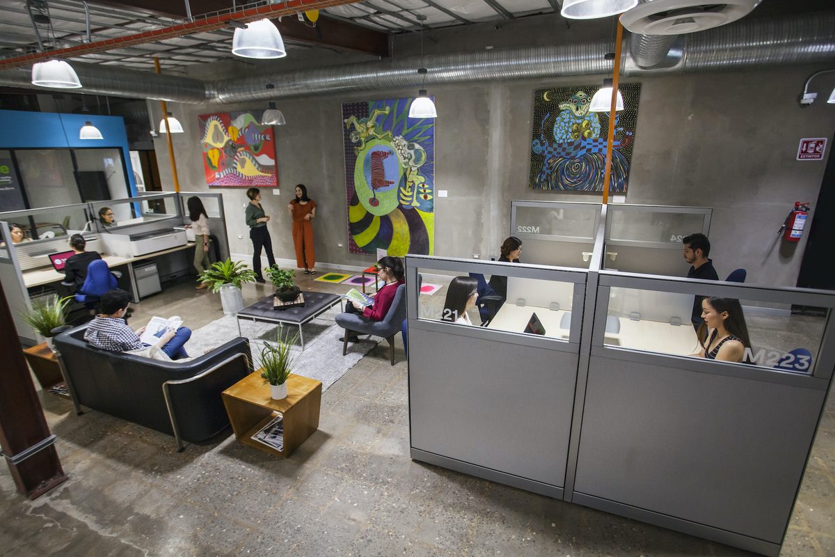 Coworking space with shared desks where remote workers and digital nomads in the Philippines plug in for the day