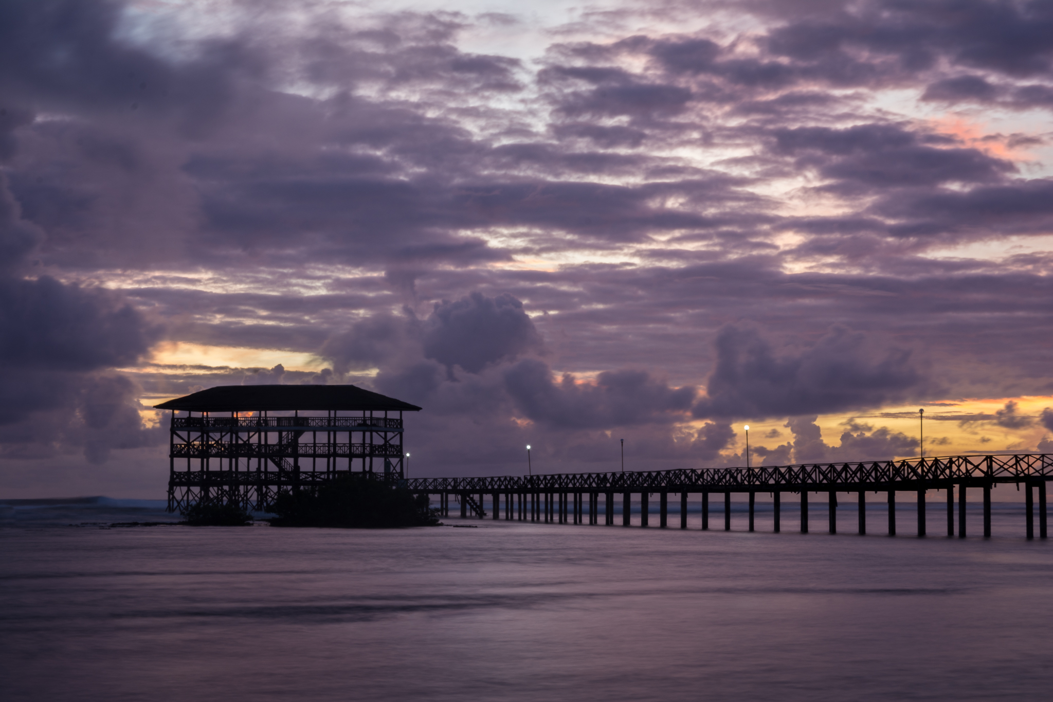 Cloud 9 surf boardwalk and viewing tower over the reef at sunset, Siargao, the final stop on this one month Philippines route