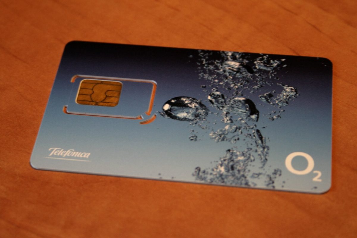 Prepaid SIM cards on a counter, the kind tourists buy in the Philippines