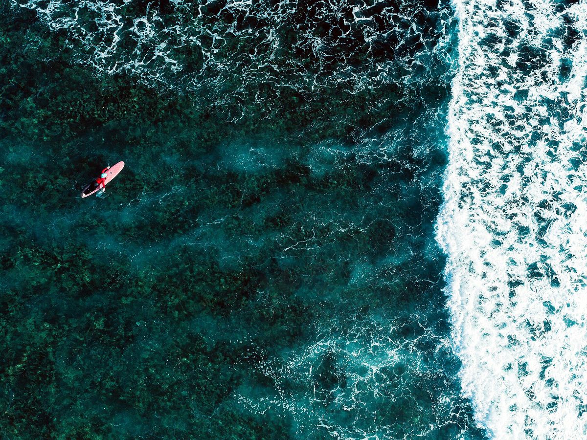 The Cloud 9 surf boardwalk on Siargao Island, where beginner surf lessons start in gentler breaks