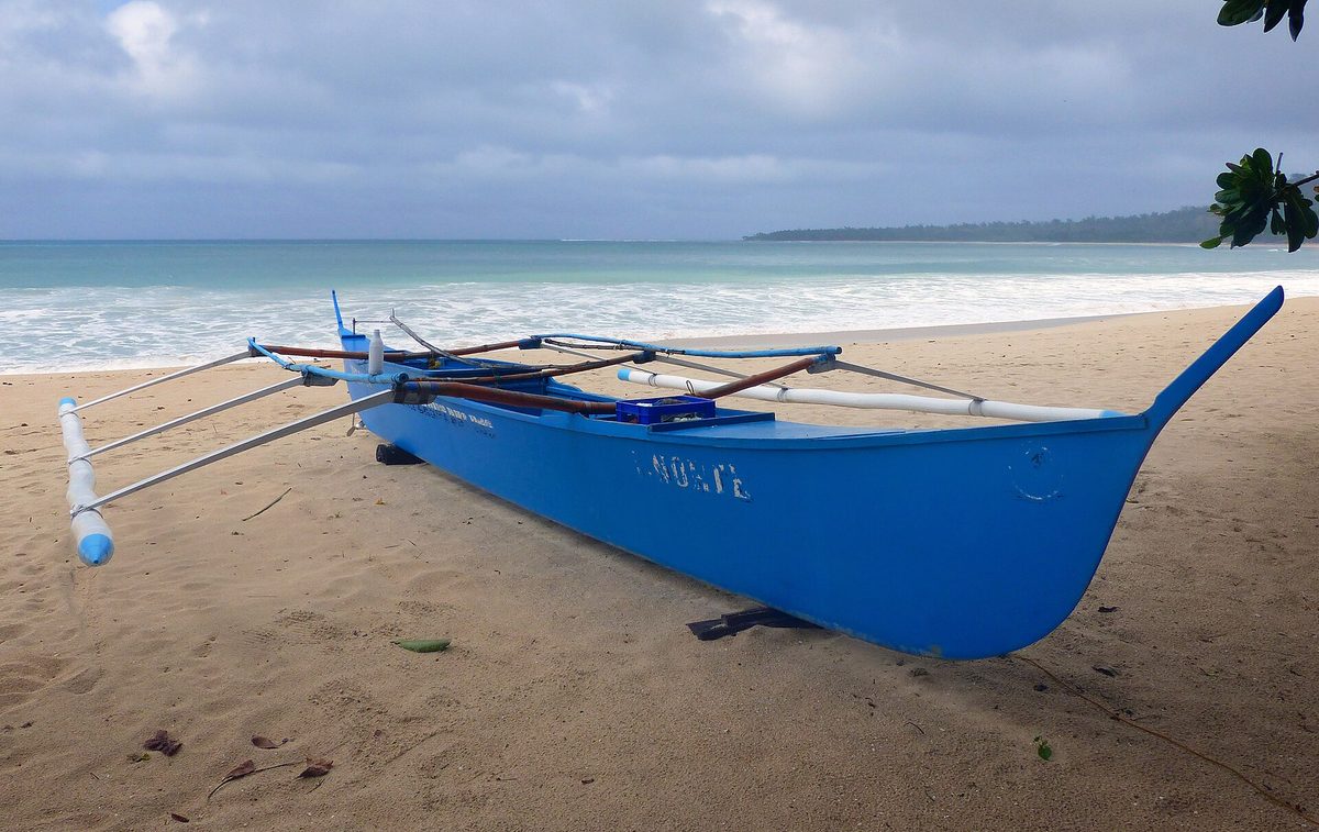 Traditional outrigger banca boat used for island hopping tours in the Philippines