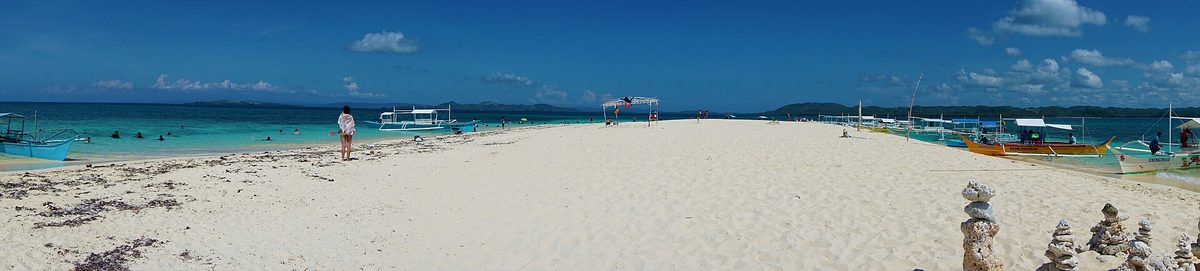 Naked Island near Siargao, a bare white sandbar with no trees surrounded by turquoise water