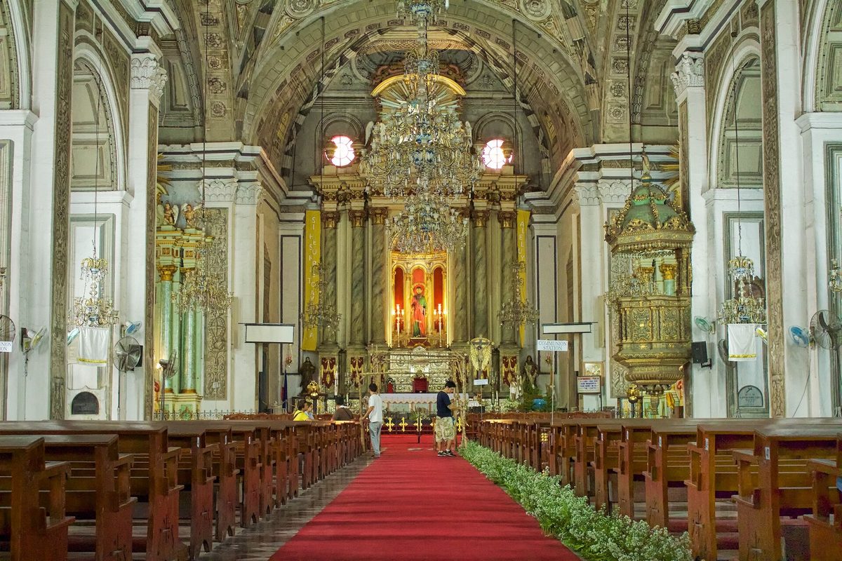 The ornate interior and gilded retablo of San Agustin Church, the oldest stone church in the Philippines, in Intramuros, Manila