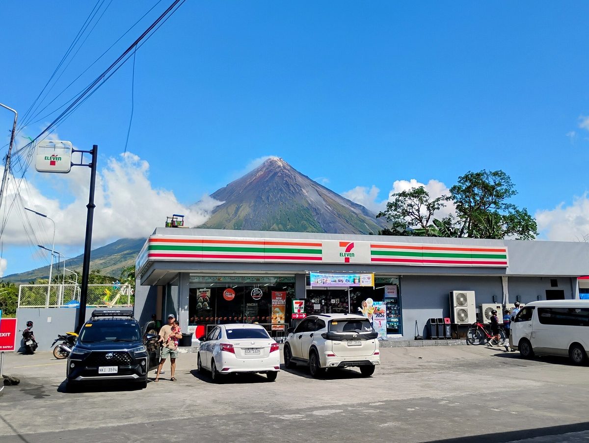 Mayon, the most photographed of the volcanoes in the Philippines, showing its near-perfect cone over Albay