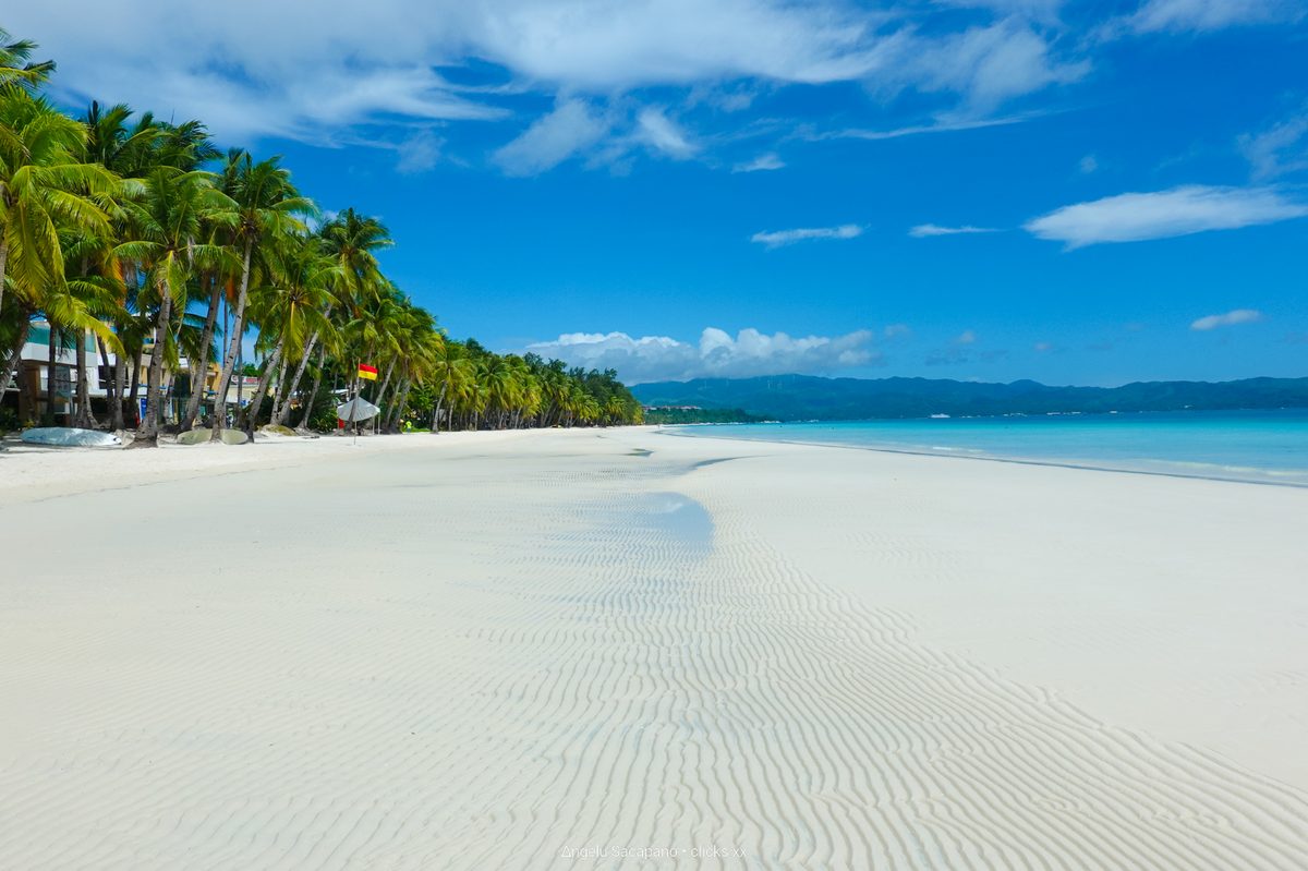 The powder-white sand and turquoise water of white beach boracay along the western shore