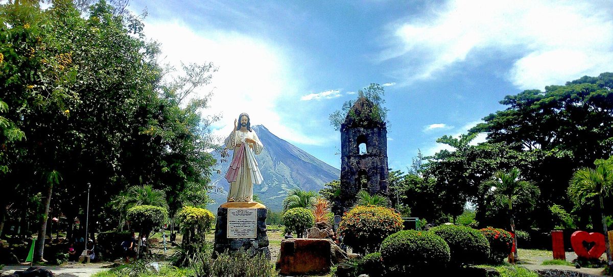 Mayon volcano framed behind the ruined belfry of Cagsawa Church in Albay